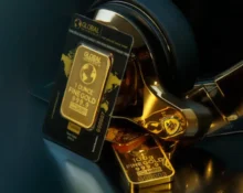 Harga emas turun dari rekor tertinggi minggu ini